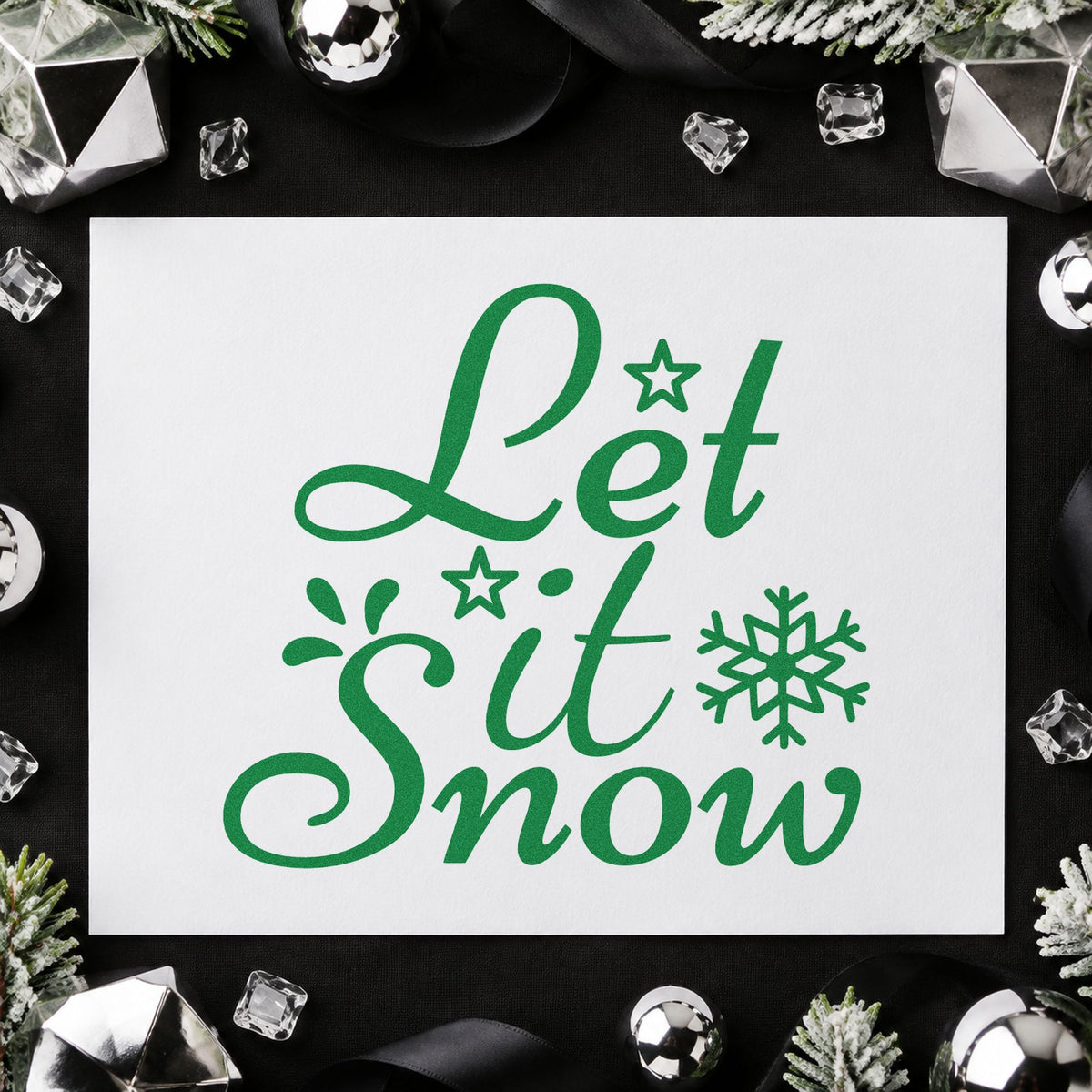Let It Snow Stars craft stamp imprint in green ink on a handmade project, one idea being season pass cards.