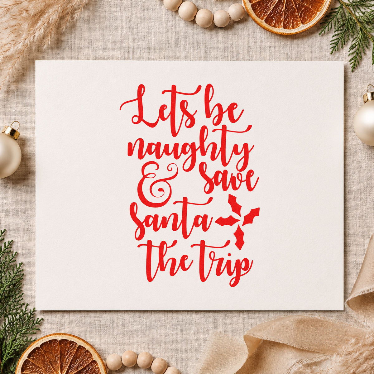 Let's Be Naughty Save Santa rubber stamp shown in red ink, stamped for projects such as cooler bin labels.