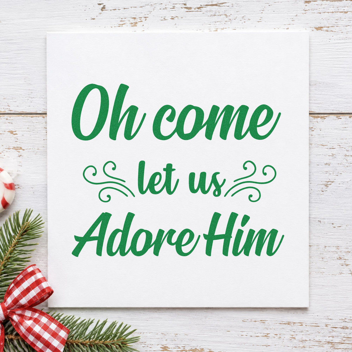 Oh Come Let Us Adore Him craft stamp imprint in green ink on a handmade project, one idea being songbook cover tags.