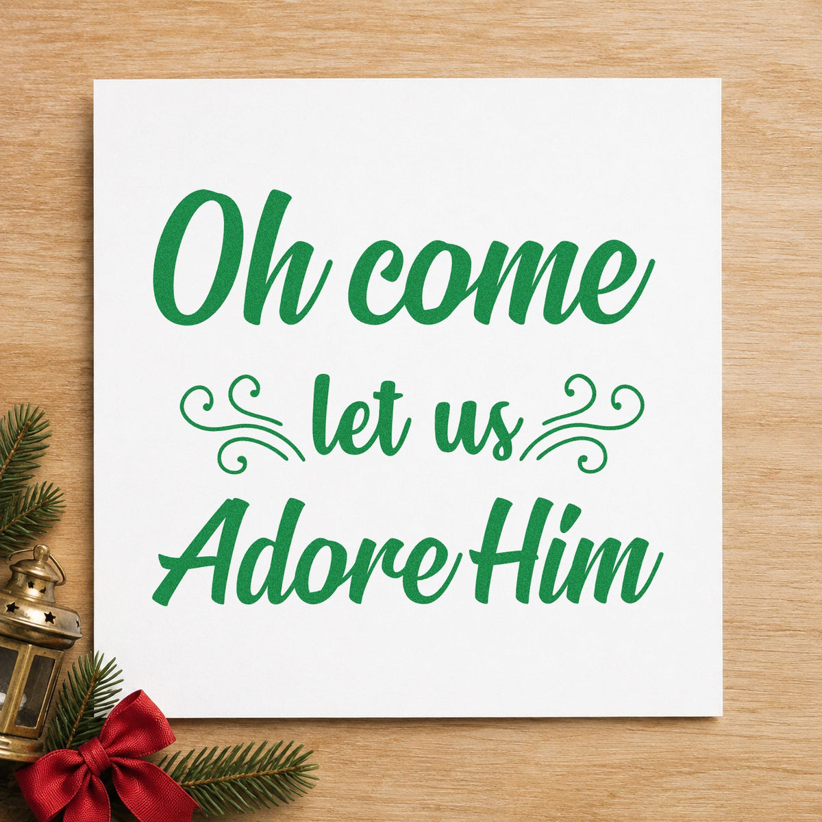 Oh Come Let Us Adore Him craft stamp imprinted in green ink on paper, a design suited to framed green room.