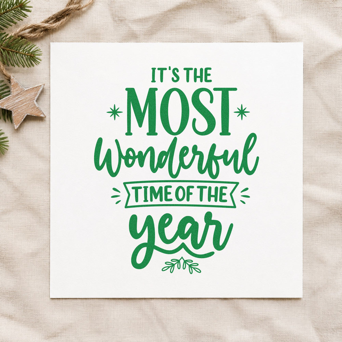 Most Wonderful Time Of Year craft stamp imprint in green ink on a handmade project, one idea being boxed price tags.