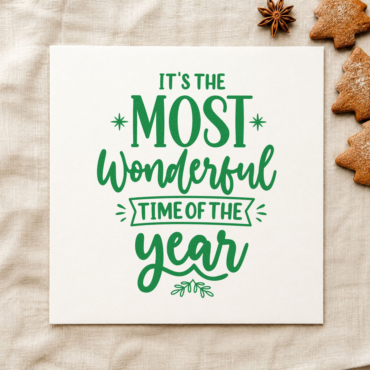 Most Wonderful Time Of Year craft stamp imprint in green ink on a handmade project, one idea being sale table placards.