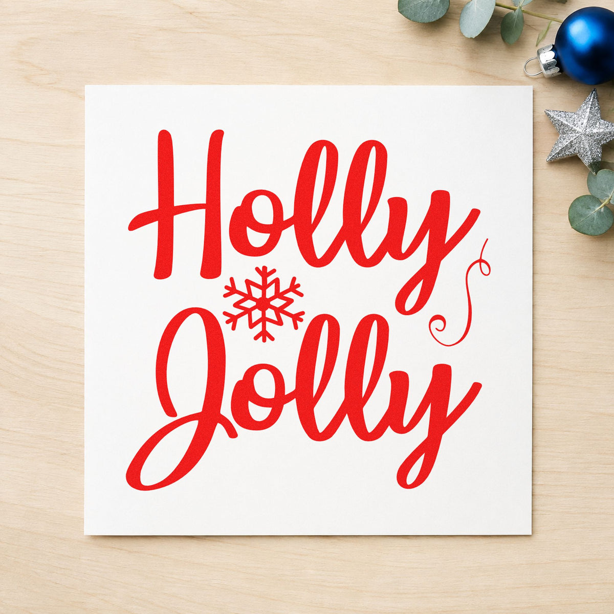Holly Jolly Snowflake rubber stamp shown in red ink, stamped for projects such as shelf tag labels.