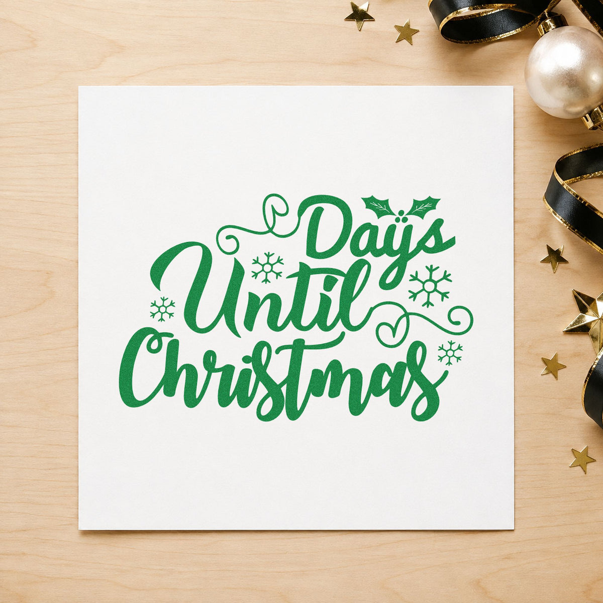 Days Until Christmas craft stamp imprint in green ink on a handmade project, one idea being shop window placards.