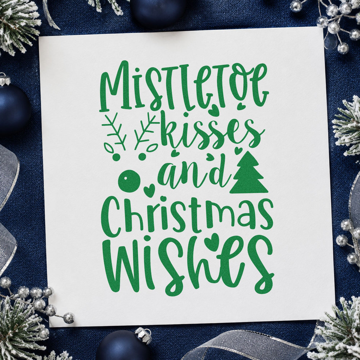 Mistletoe Kisses Christmas Wishes craft stamp imprinted in green ink on paper, a design suited to framed welcome easel.