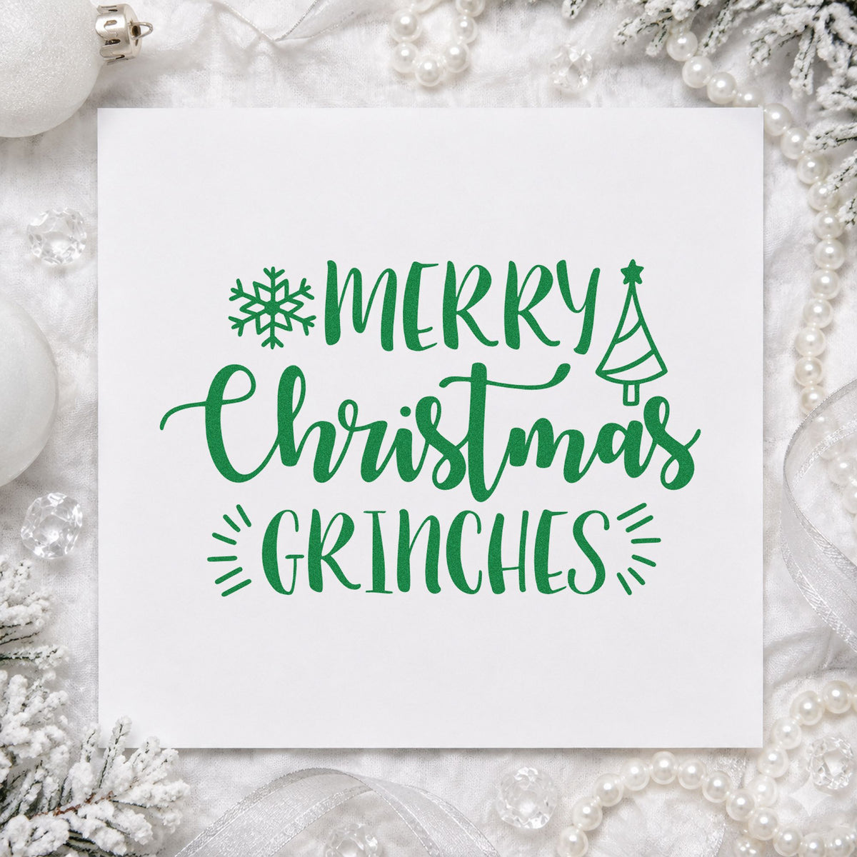 Merry Christmas Grinches craft stamp imprint in green ink on a handmade project, one idea being party escape placards.
