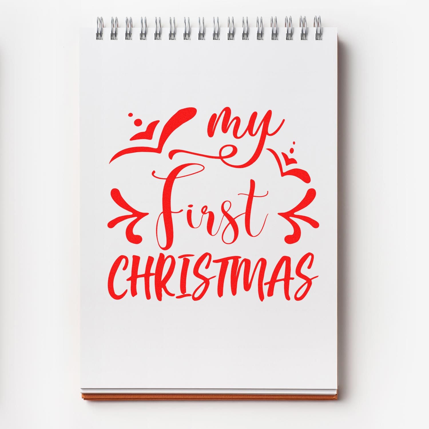 My First Christmas rubber stamp design in festive red script, perfect for holiday cards, baby announcements, and scrapbook keepsakes.