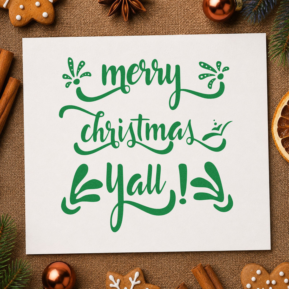 Merry Christmas Yall craft stamp imprint in green ink on a handmade project, one idea being bouquet gift tags.