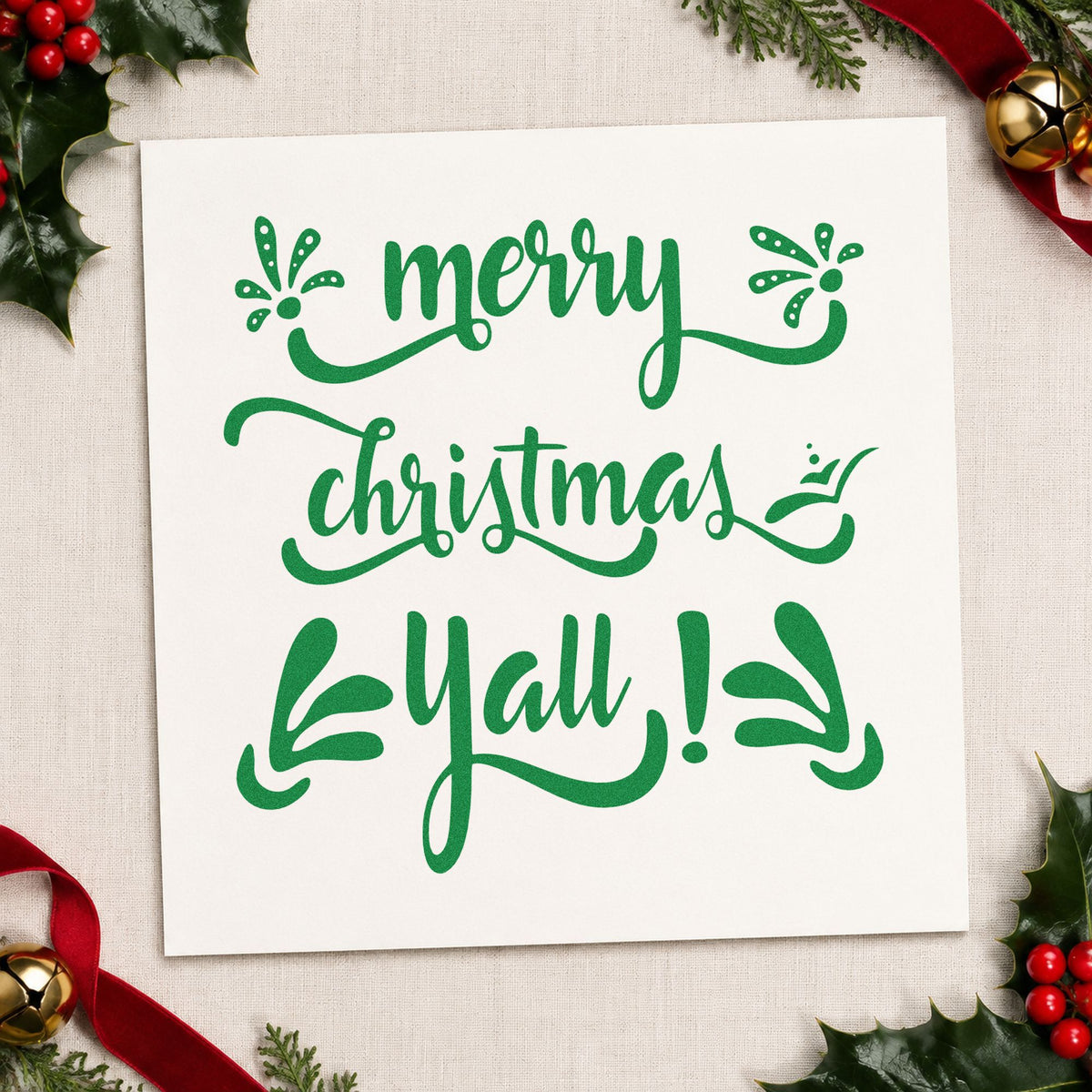 Merry Christmas Yall craft stamp imprinted in green ink on paper, a design suited to framed sunroom wall.