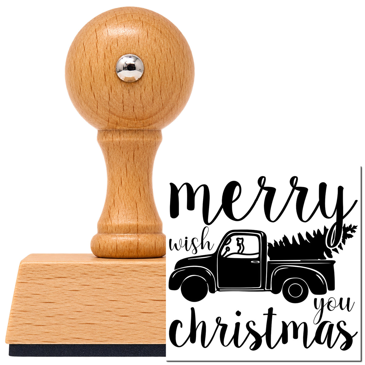 Merry Christmas Pickup Tree Vintage Pro rubber stamp in European beech wood with a round knob handle, shown beside its black imprint.