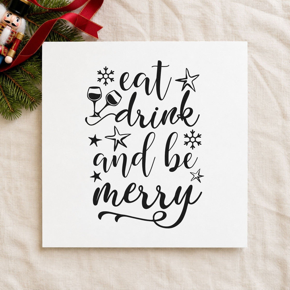 Eat Drink And Be Merry rubber stamp printed in black ink, ready for clinking glasses cards and similar paper crafts.