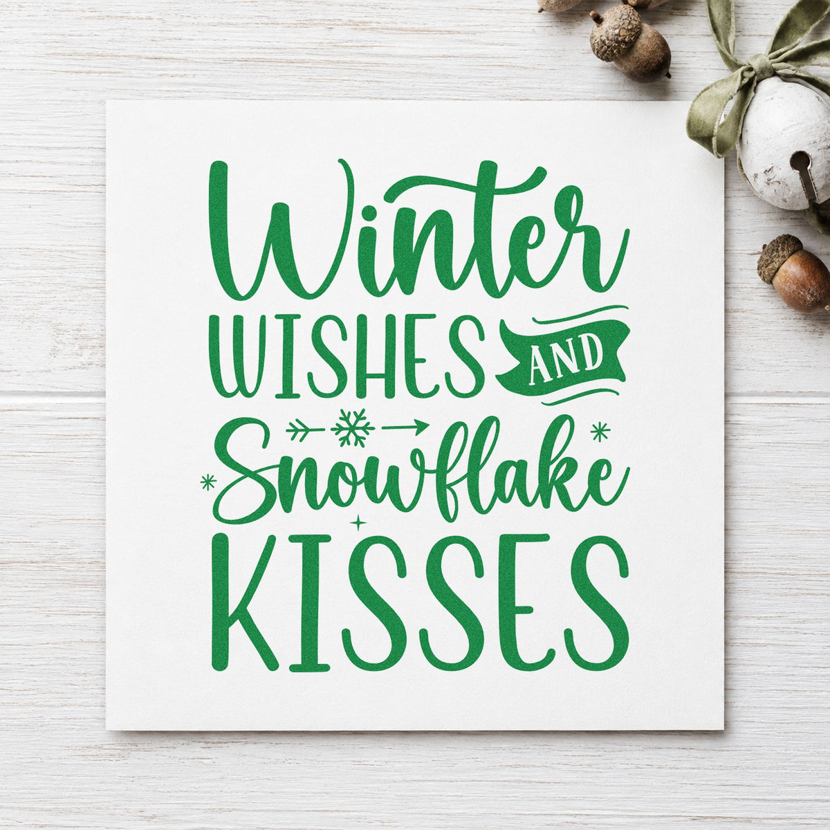 Winter Wishes Snowflake Kisses craft stamp imprinted in green ink on paper, a design suited to framed hall runner.