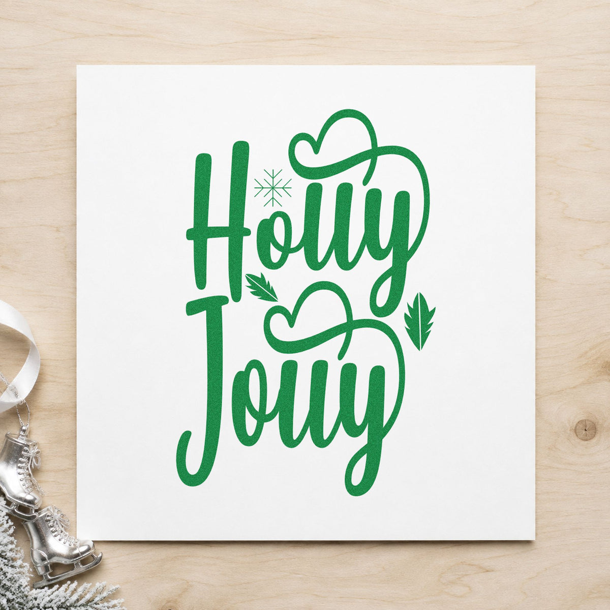 Holly Jolly Hearts craft stamp imprint in green ink on a handmade project, one idea being heart tie gift tags.
