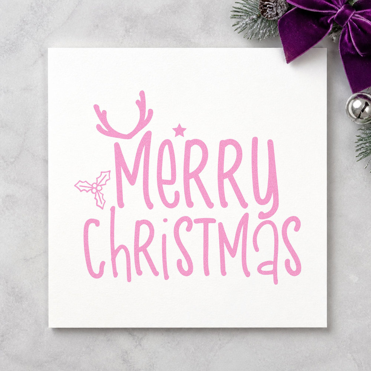 Merry Christmas Antlers Holly craft stamp in purple ink on cardstock, an easy option for simple album header.