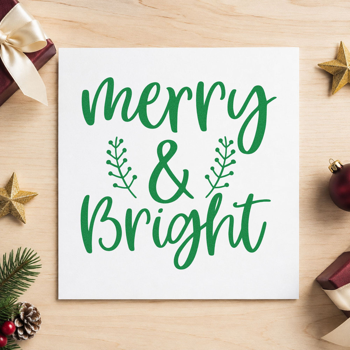 Merry And Bright Leafy Sprigs craft stamp imprinted in green ink on paper, a design suited to framed matched duo.