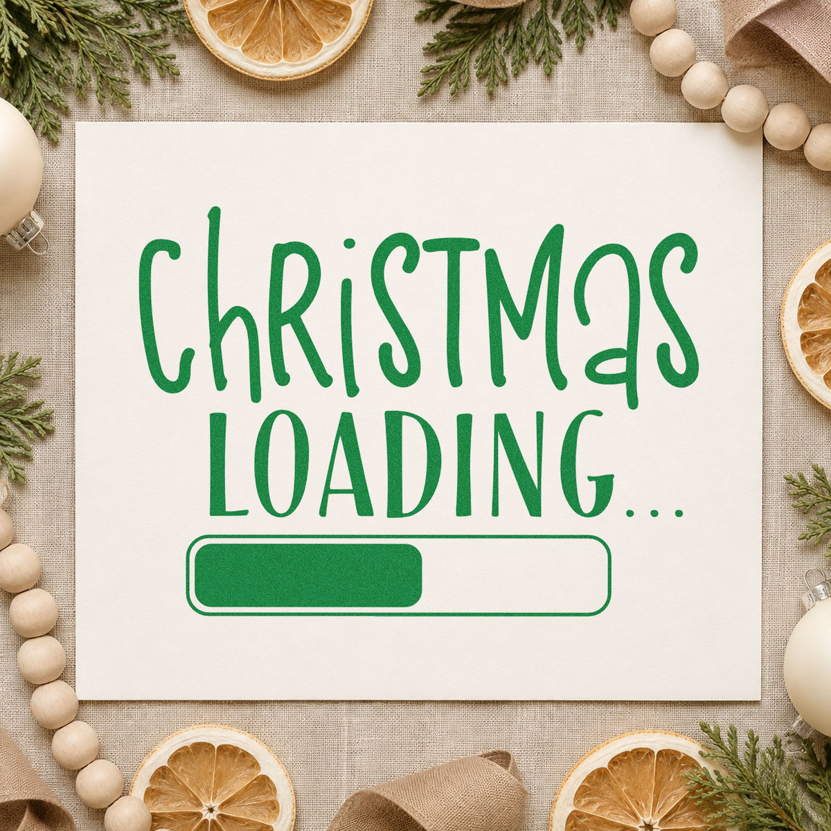 Christmas Loading Progress Bar craft stamp imprint in green ink on a handmade project, one idea being preorder gift tags.