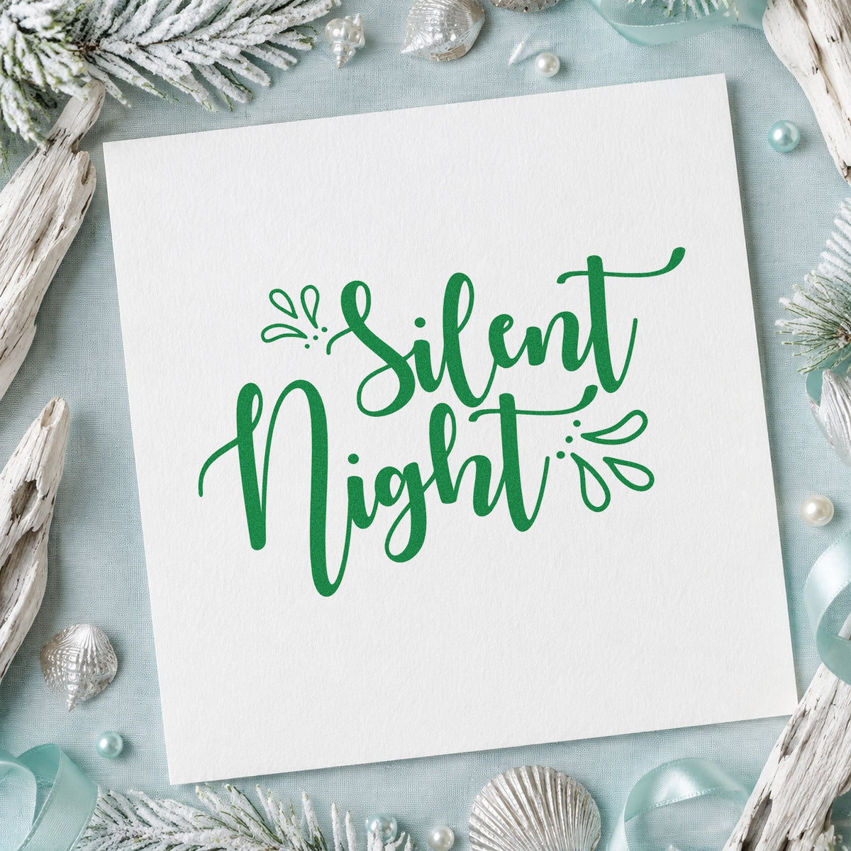 Silent Night Leaf Accents craft stamp imprint in green ink on a handmade project, one idea being book gift tags.