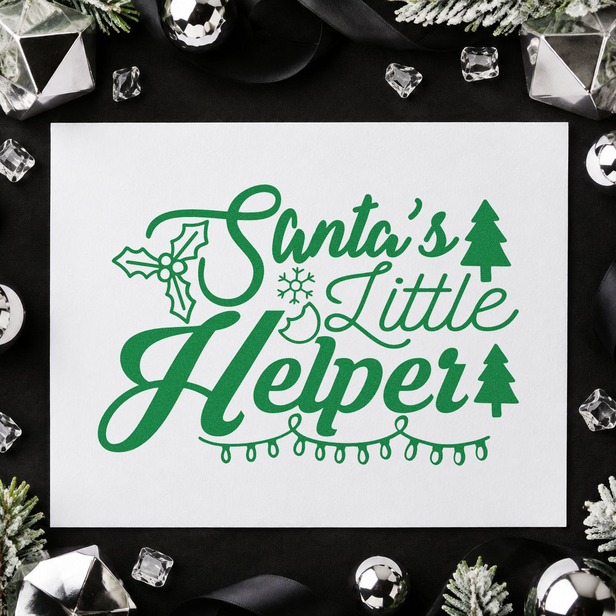 Santa's Little Helper Lights craft stamp imprinted in green ink on paper, a design suited to framed break area.