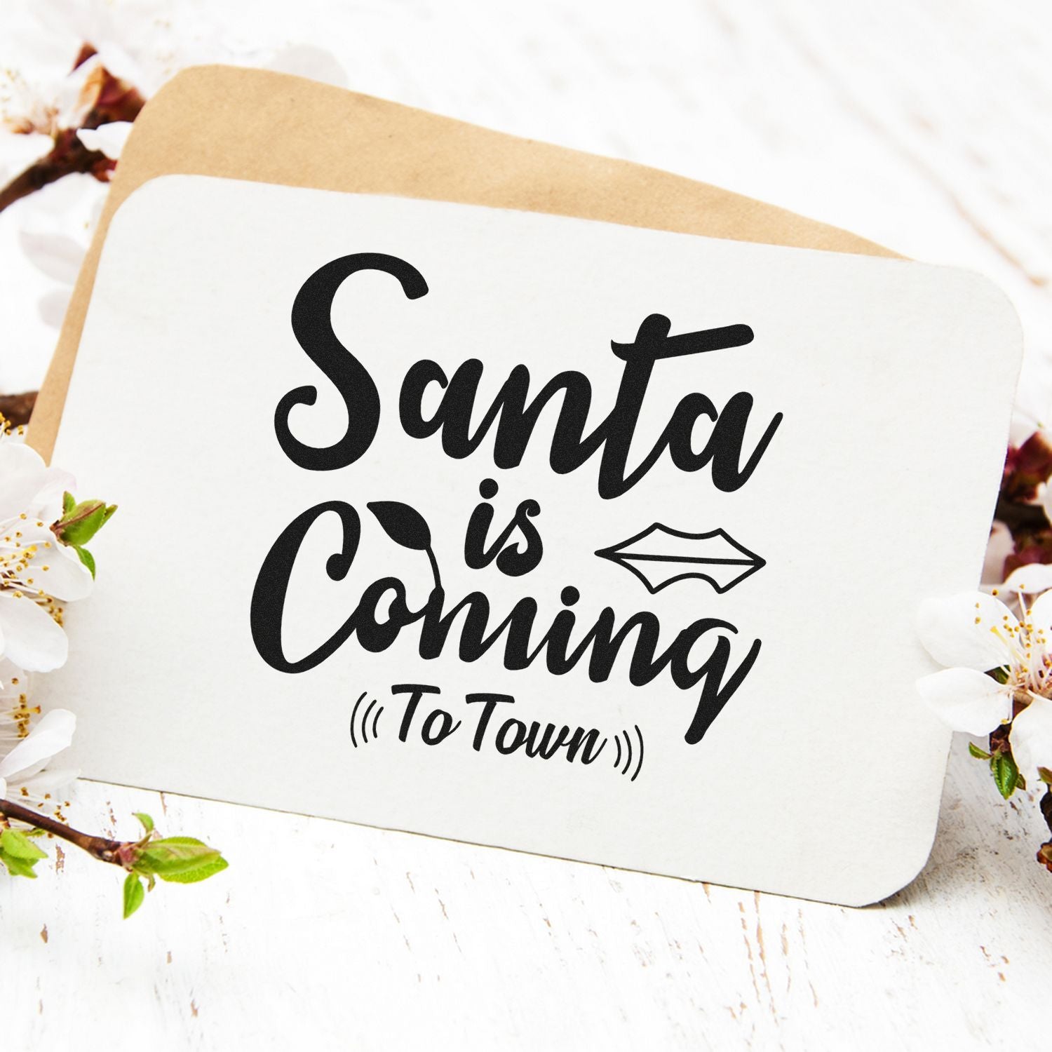 Santa is Coming to Town Christmas rubber stamp design for holiday cards, tags, and festive packaging.