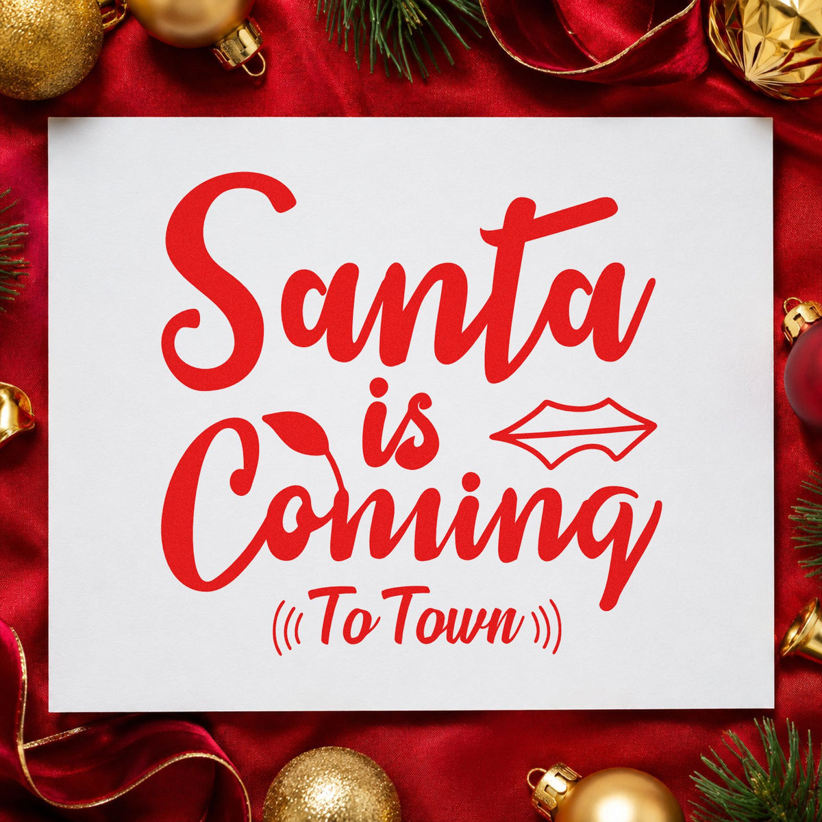 Santa Is Coming To Town craft stamp in red ink on cardstock, an easy option for tee chest printing.