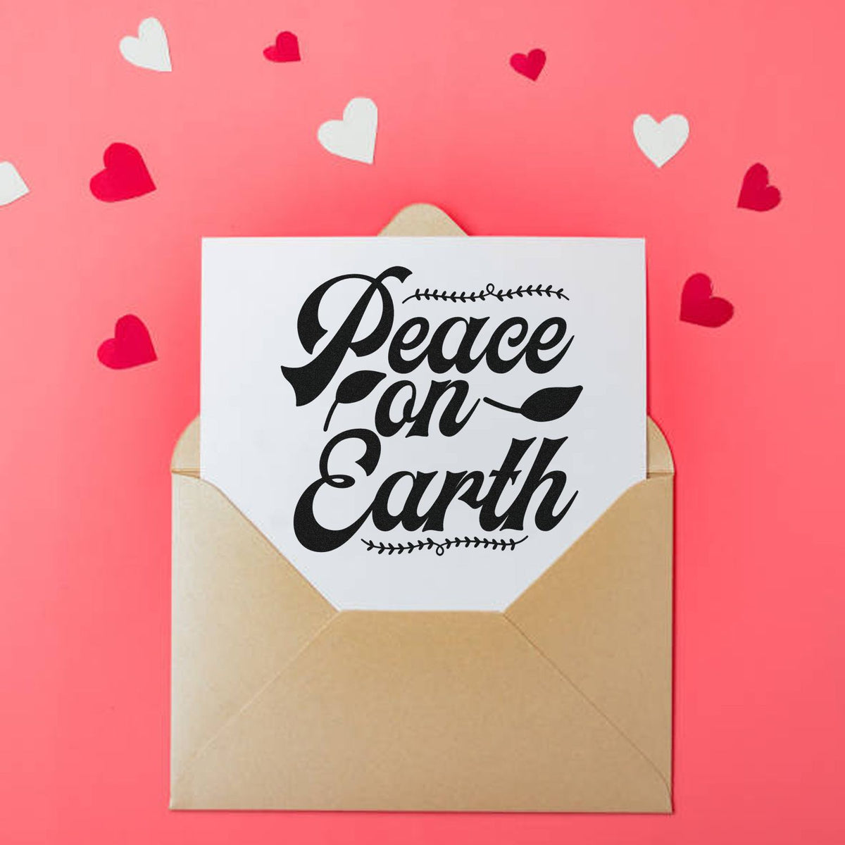 Leaf Border Peace On Earth Premium Wood-Mounted Stamp - Vintage Pro imprint stamped in black ink. "Peace on Earth" appears in heavy slanted script between narrow leafy borders.