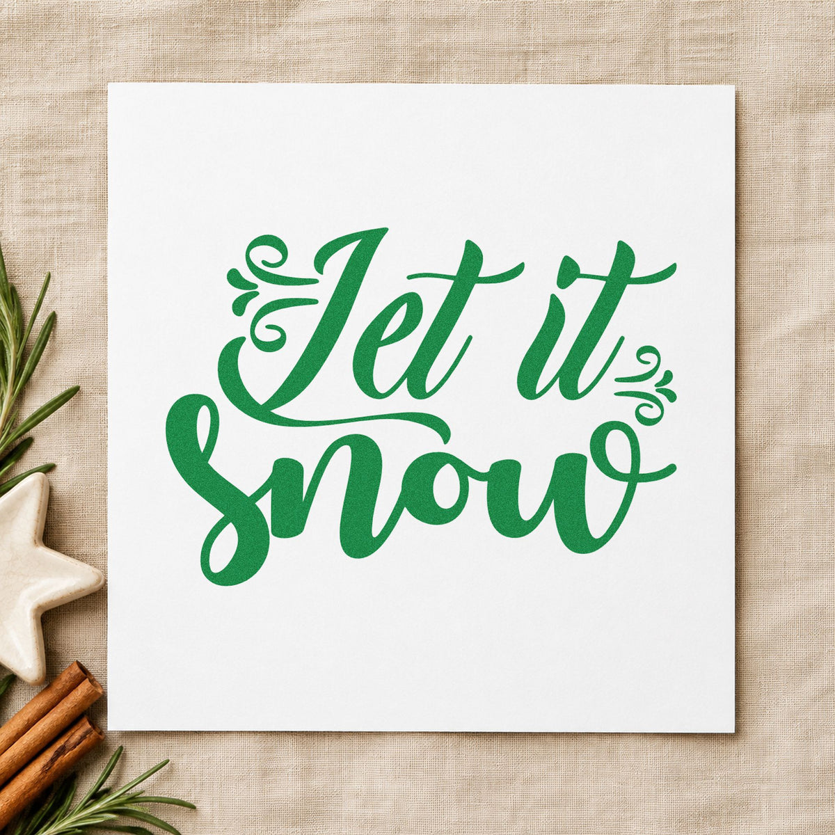 Let It Snow Decorative Script craft stamp imprint in green ink on a handmade project, one idea being boxed set gift tags.