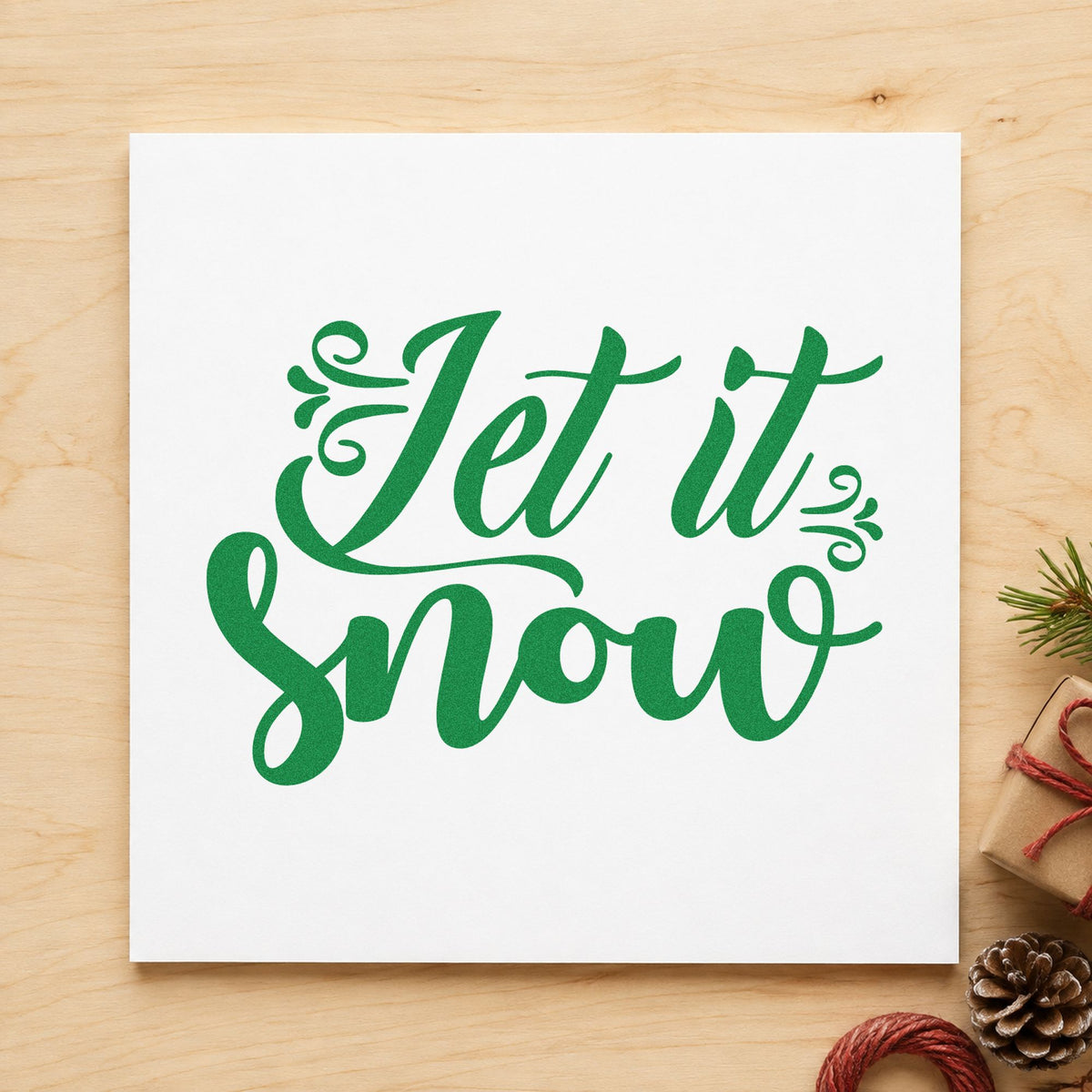 Let It Snow Decorative Script craft stamp imprinted in green ink on paper, a design suited to framed mirror duo.