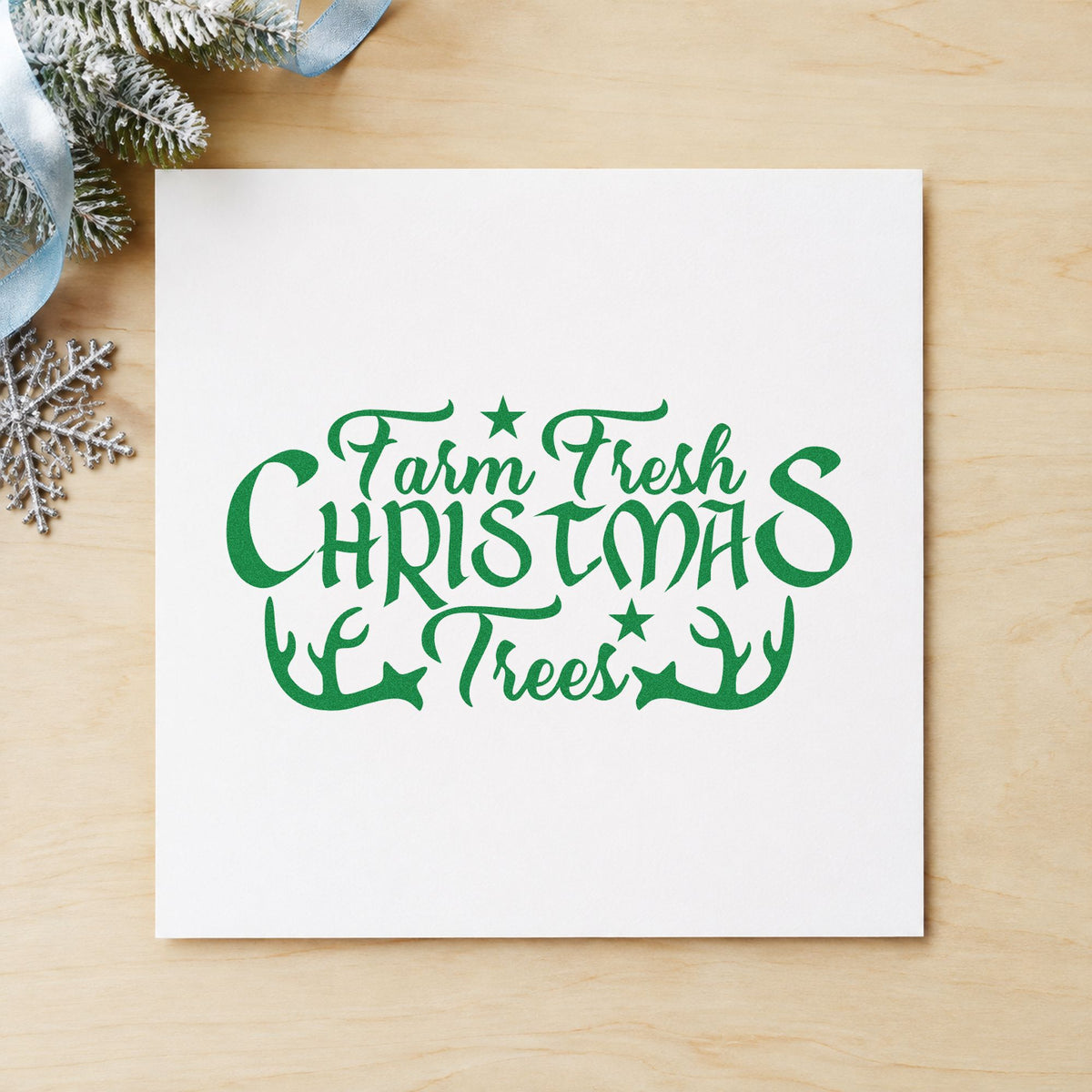 Farm Fresh Christmas Trees Antlers craft stamp imprint in green ink on a handmade project, one idea being gate entry signs.