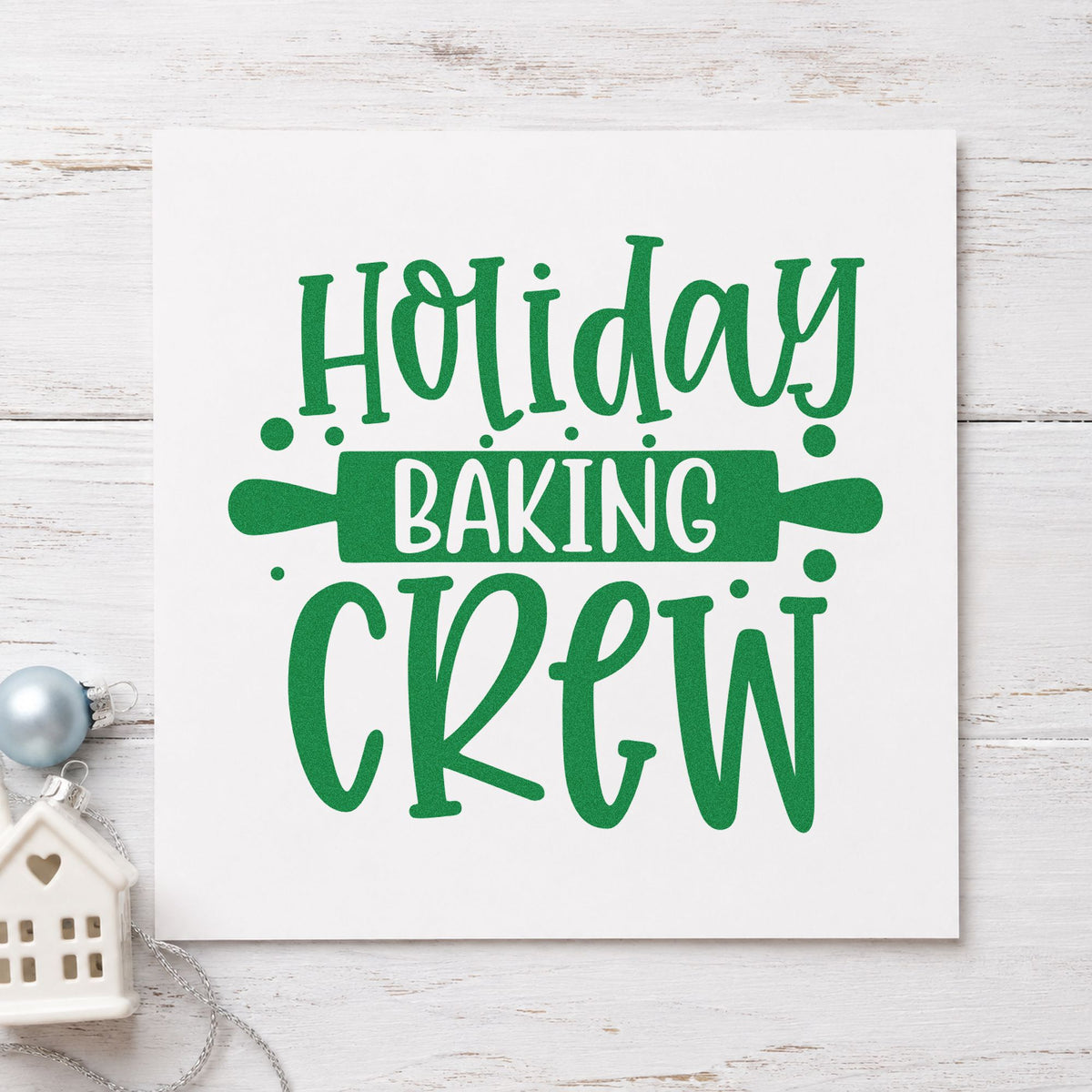 Holiday Baking Crew Rolling Pin craft stamp imprint in green ink on a handmade project, one idea being crew member tags.