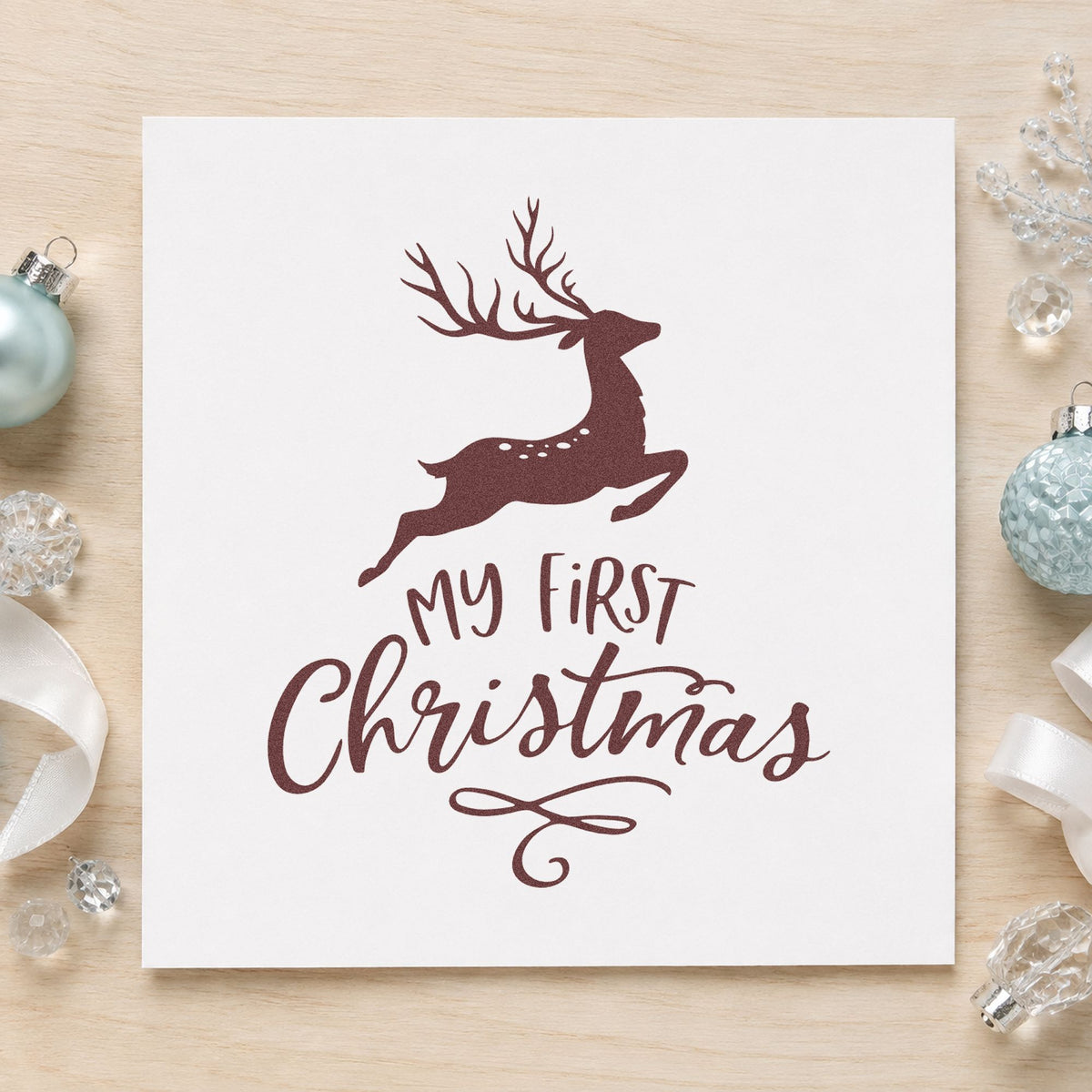 My First Christmas Reindeer rubber stamp printed in brown ink, ready for firsts log sheet and similar paper crafts.