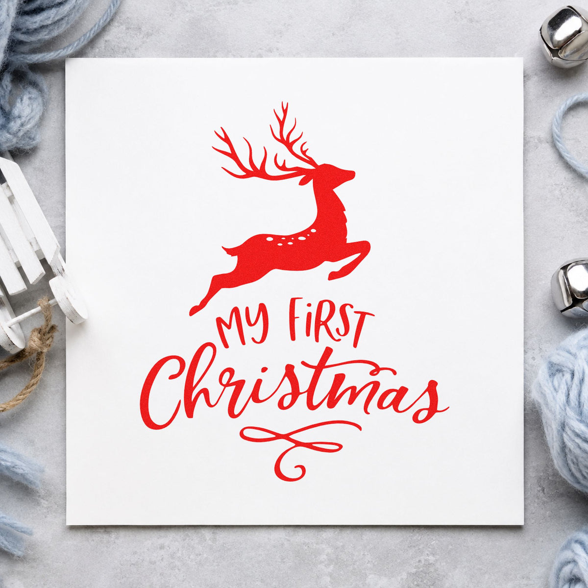 My First Christmas Reindeer rubber stamp shown in red ink, stamped for projects such as closet size labels.