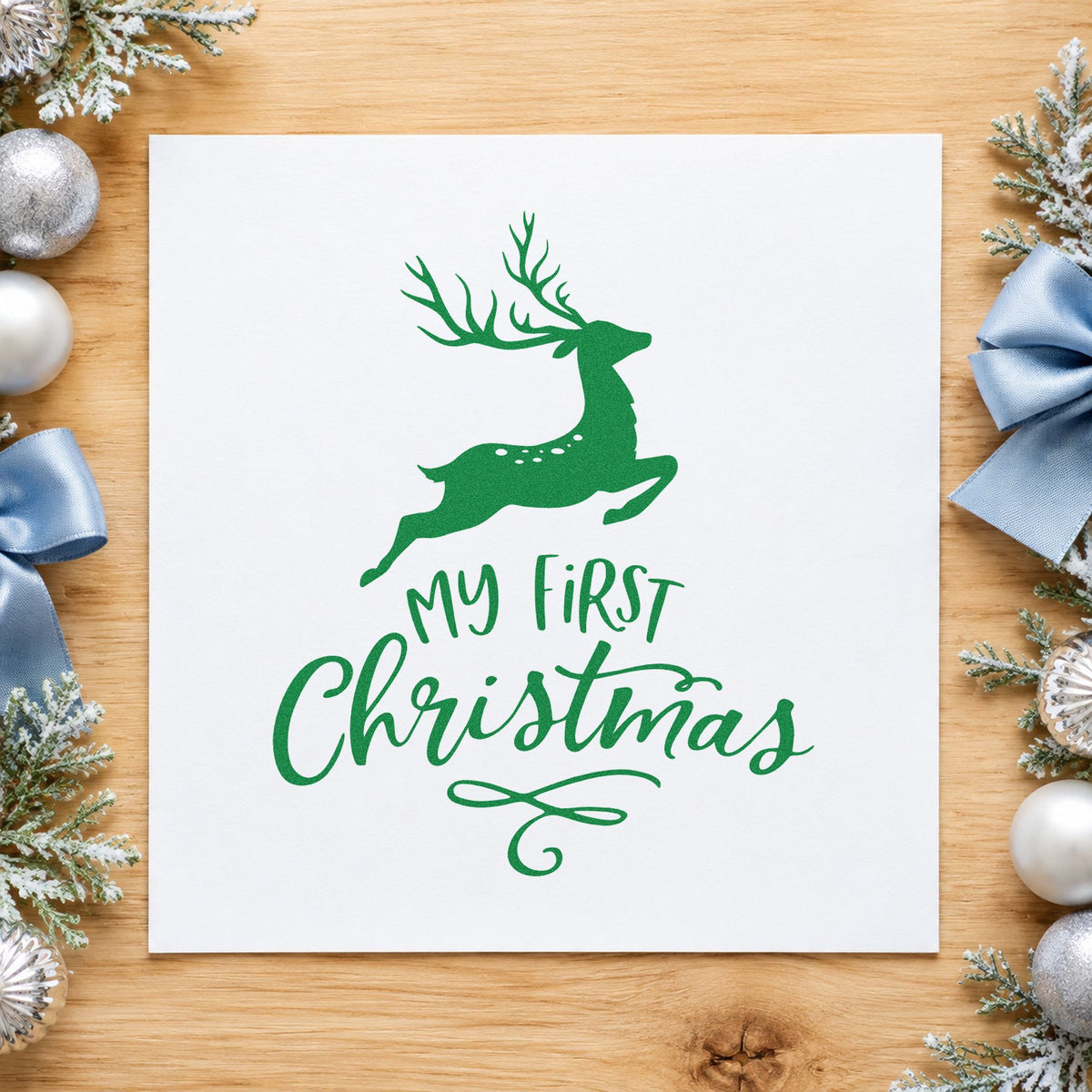 My First Christmas Reindeer craft stamp imprint in green ink on a handmade project, one idea being dedication day cards.