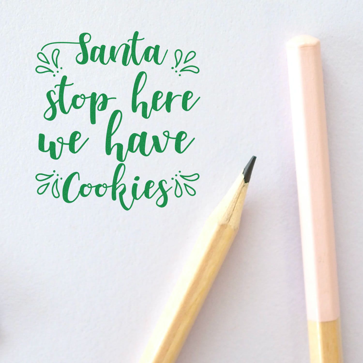 Santa stop here we have cookies rubber stamp design in green script, perfect for holiday cards and Christmas crafts.