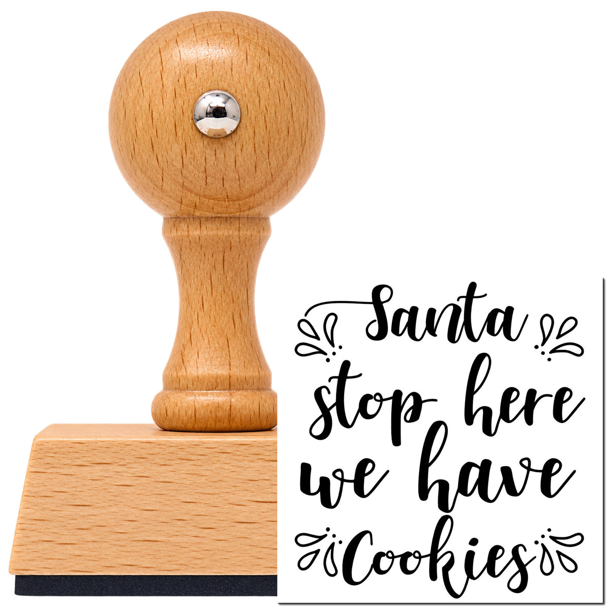 Santa Stop Here We Have Cookies Vintage Pro rubber stamp in European beech wood with a round knob handle, shown beside its black imprint.