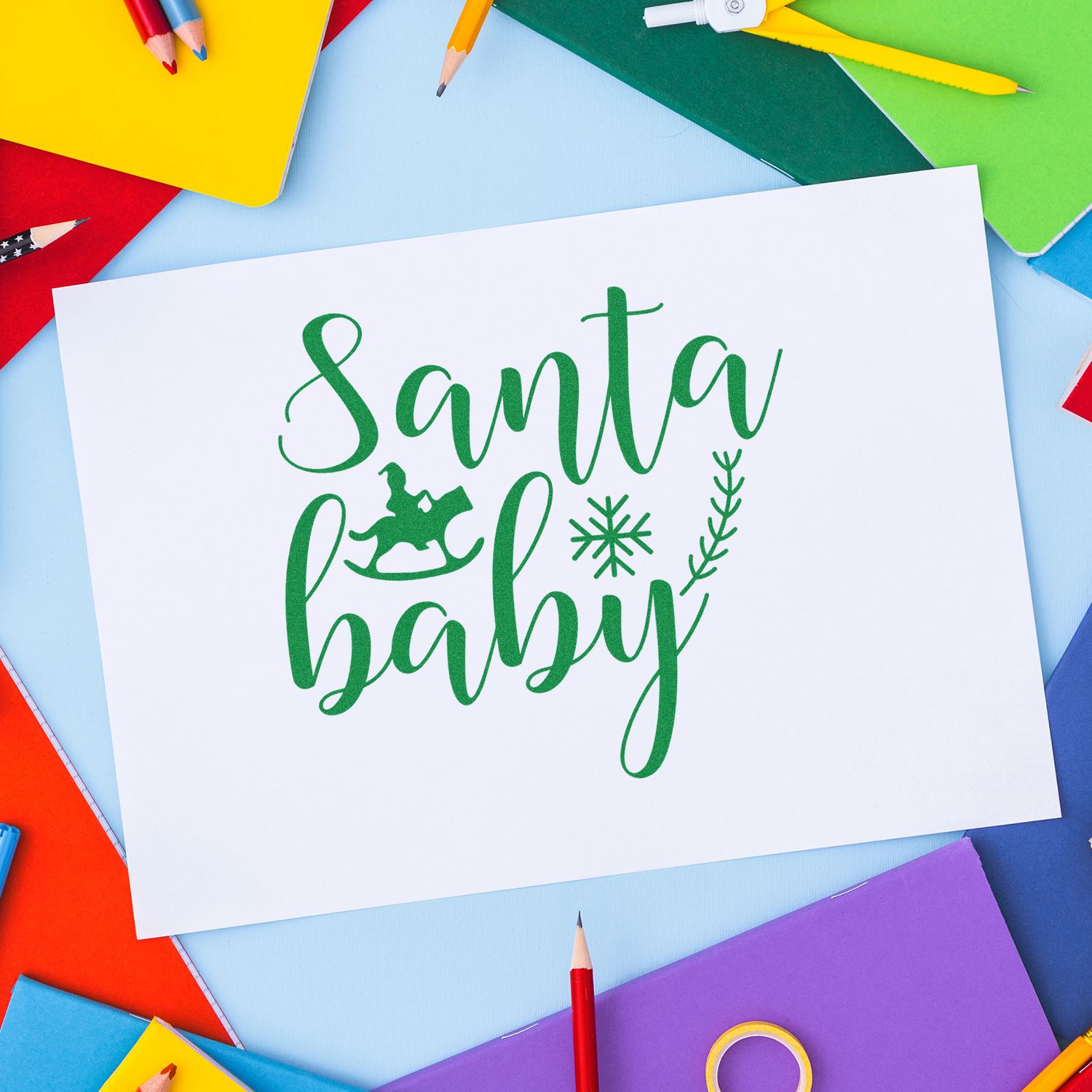 Santa Baby holiday rubber stamp design on paper, ideal for Christmas crafts, cards and festive handmade projects.