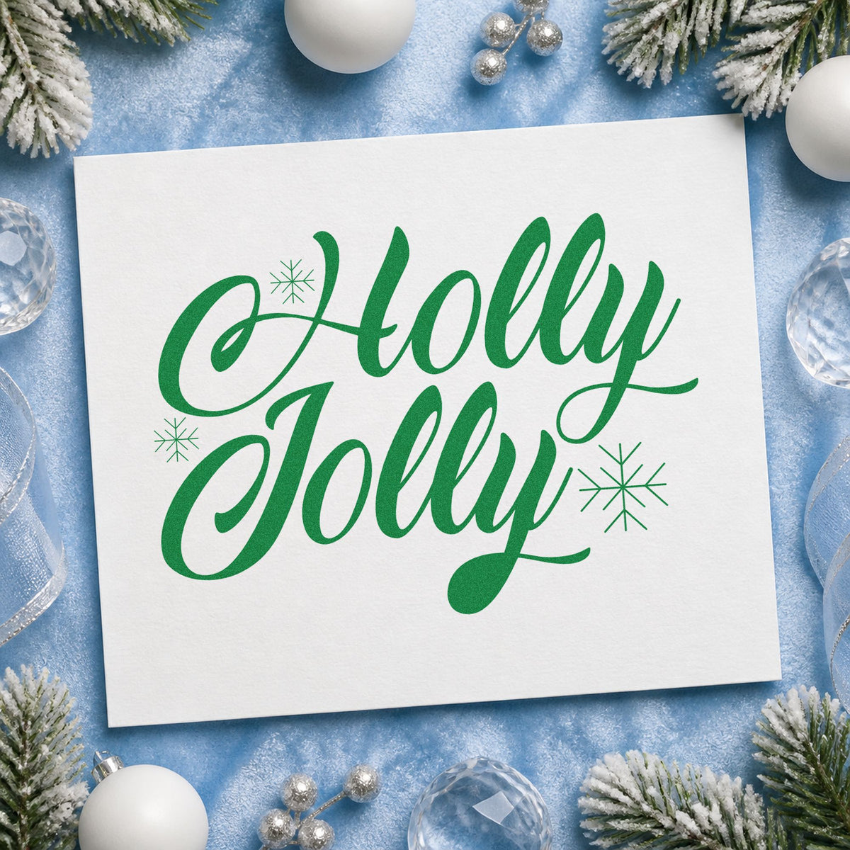 Holly Jolly Slanted Script craft stamp imprint in green ink on a handmade project, one idea being angled gift tags.