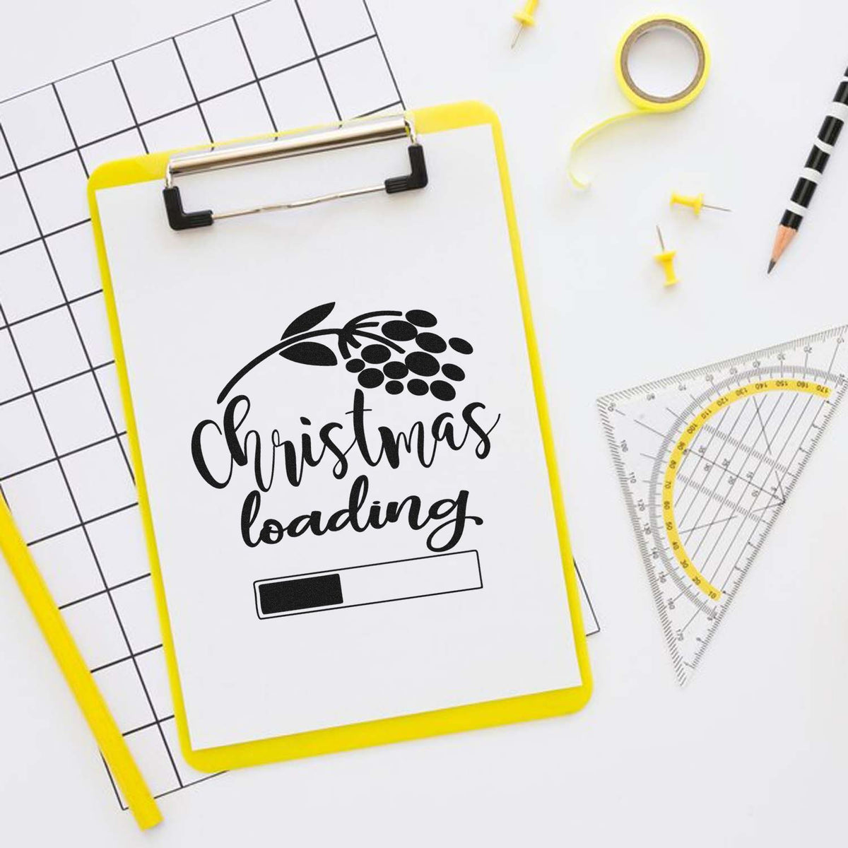 Christmas Loading Berry Branch Premium Wood-Mounted Stamp - Vintage Pro imprint stamped in black ink. "Christmas Loading" appears below a berry branch and above a partly filled progress bar.