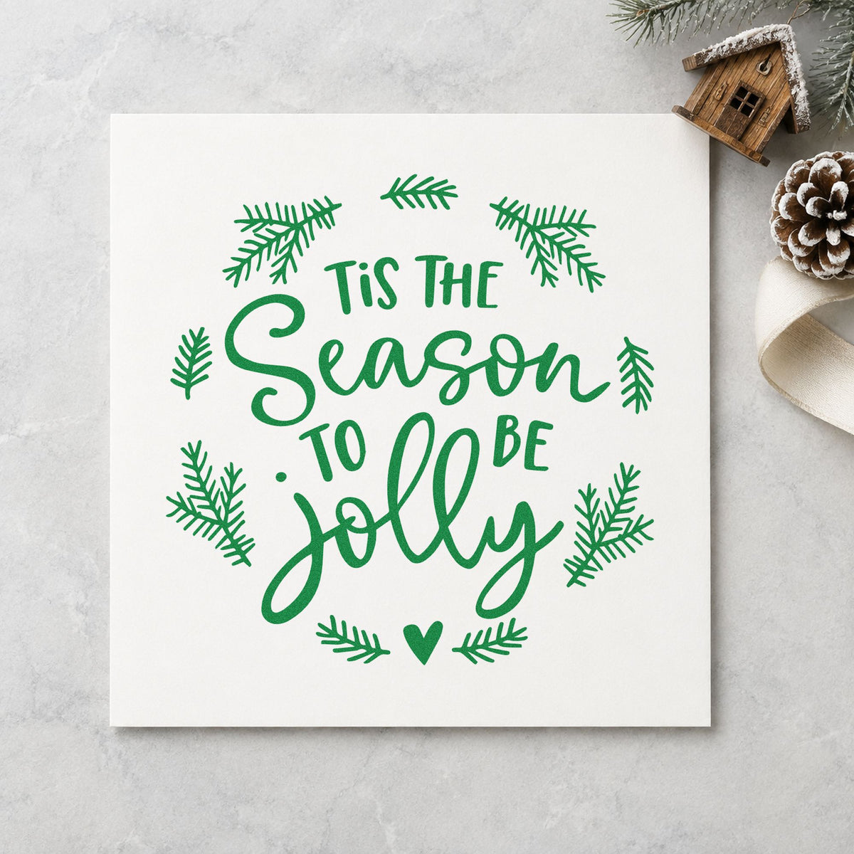 Tis Season To Be Jolly Wreath craft stamp imprinted in green ink on paper, a design suited to framed porch light.