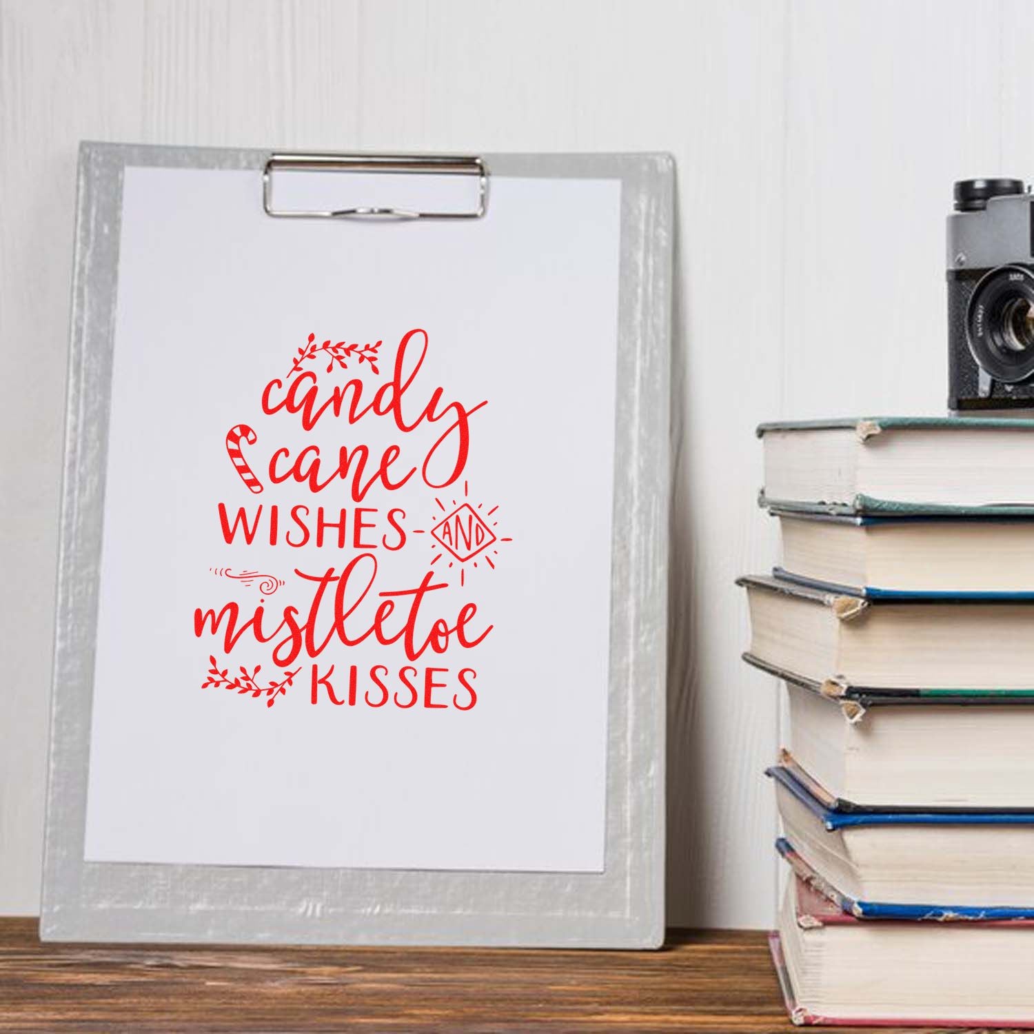 Christmas rubber stamp design with Candy Cane Wishes and Mistletoe Kisses on a clipboard display.