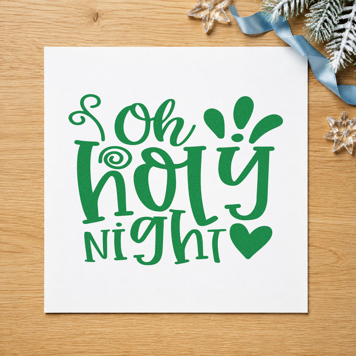 Oh Holy Night Heart craft stamp imprint in green ink on a handmade project, one idea being candlelight cards.