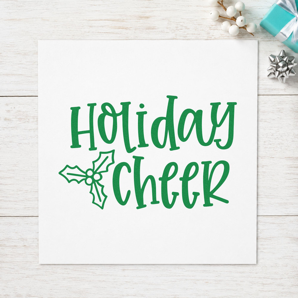 Holiday Cheer Holly craft stamp imprinted in green ink on paper, a design suited to framed assembly room.