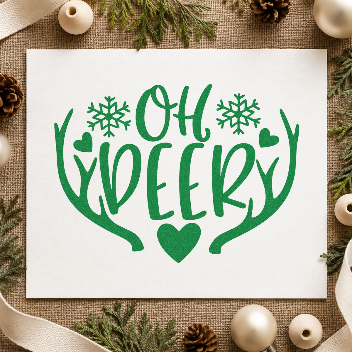 Oh Deer Antlers Snowflakes craft stamp imprint in green ink on a handmade project, one idea being plush deer gift tags.