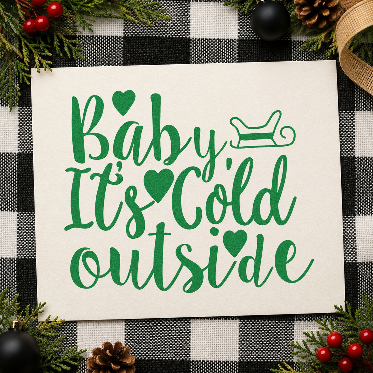 Baby It's Cold Outside Sleigh craft stamp imprint in green ink on a handmade project, one idea being anniversary menus.