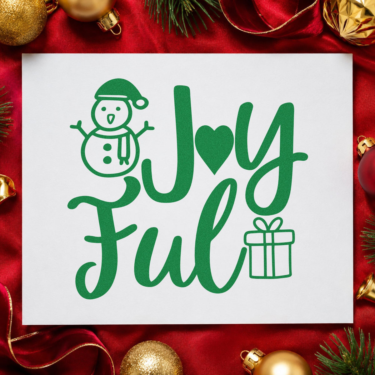 Joyful Snowman And Gift craft stamp imprint in green ink on a handmade project, one idea being swapped gift tags.