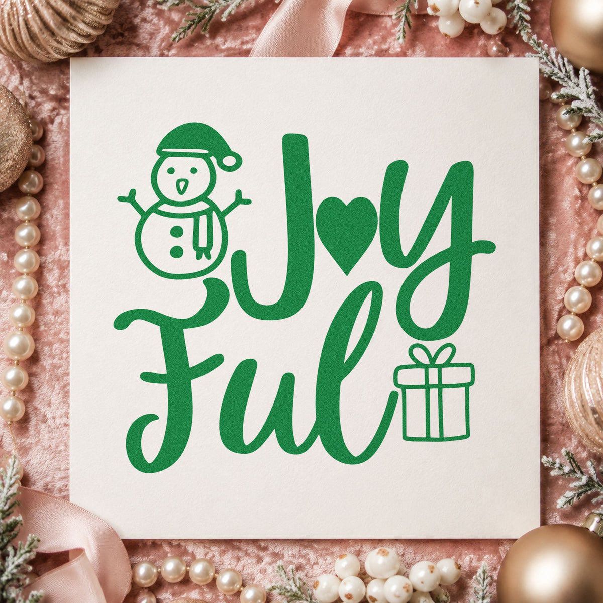 Joyful Snowman And Gift craft stamp imprinted in green ink on paper, a design suited to framed playful pair.