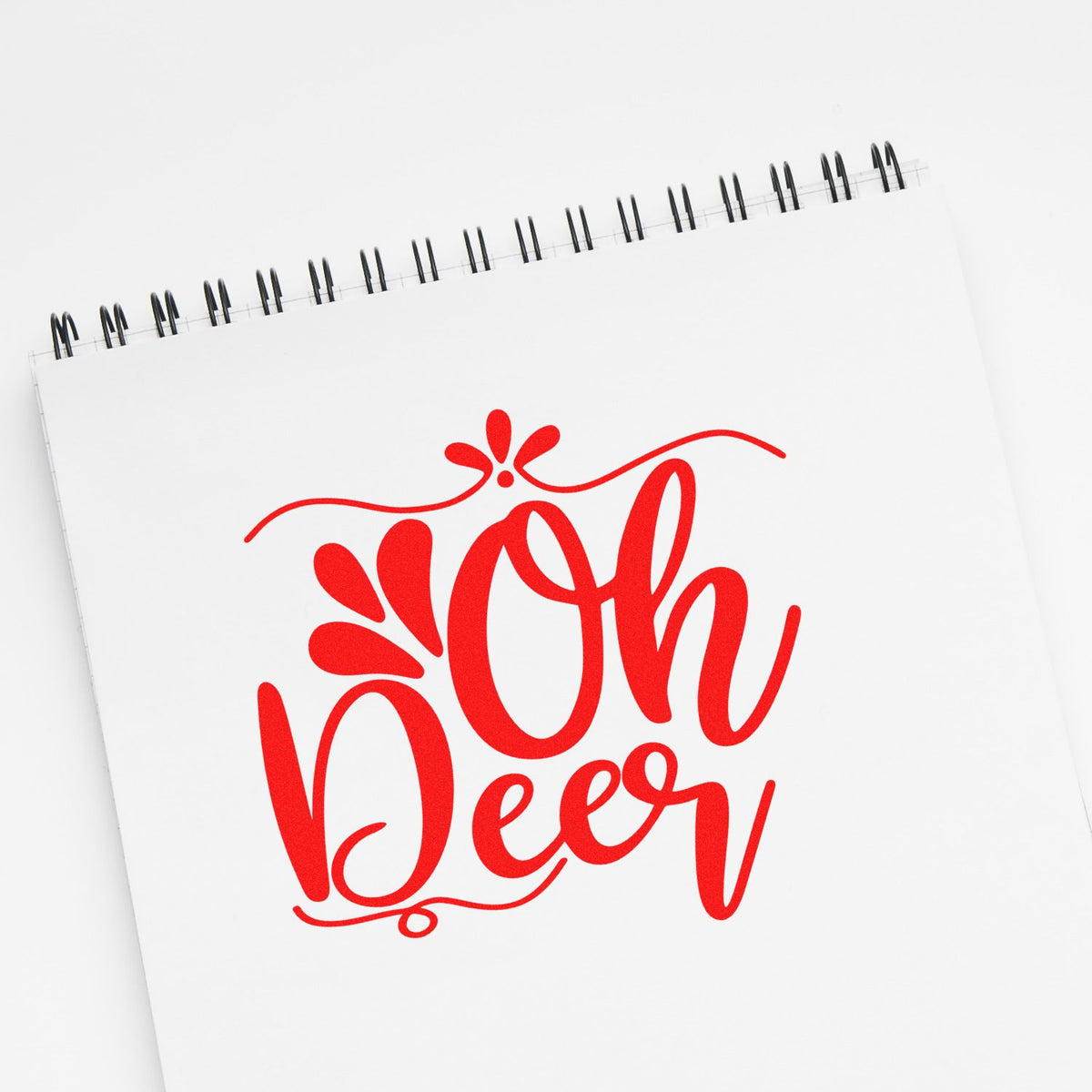 Oh Deer Ornamental Script rubber stamp shown in red ink, stamped for projects such as full bleed album page.