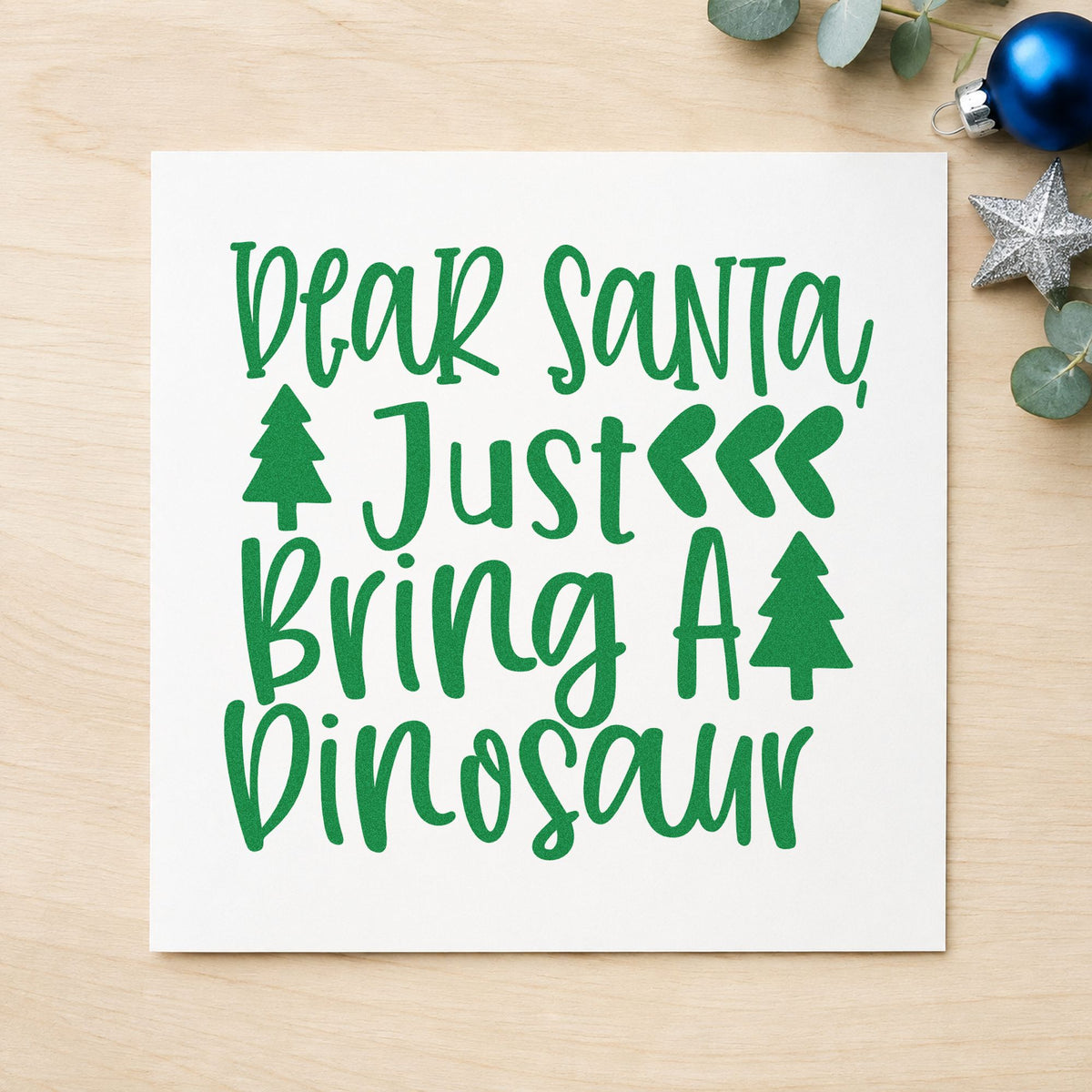 Dear Santa Bring Dinosaur craft stamp imprint in green ink on a handmade project, one idea being figure set gift tags.