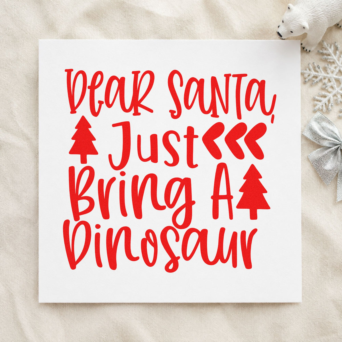 Dear Santa Bring Dinosaur craft stamp in red ink on cardstock, an easy option for tee chest printing.