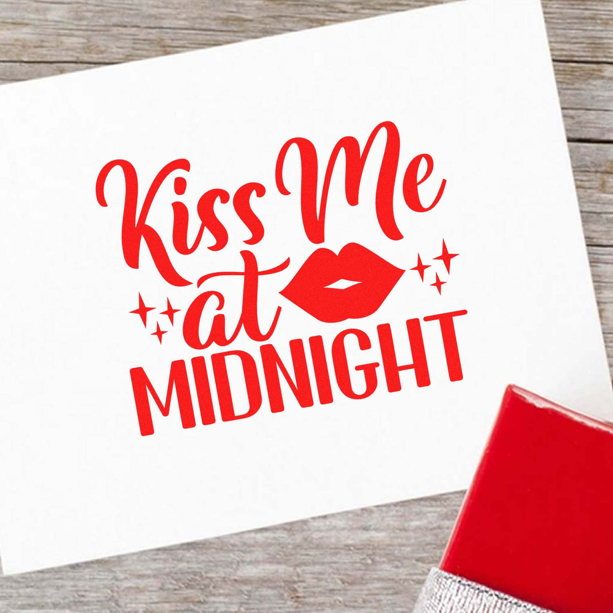 Kiss Me At Midnight rubber stamp shown in red ink, stamped for projects such as midnight album page.