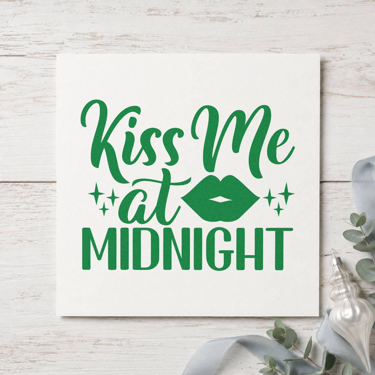 Kiss Me At Midnight craft stamp imprinted in green ink on paper, a design suited to framed vanity corner.